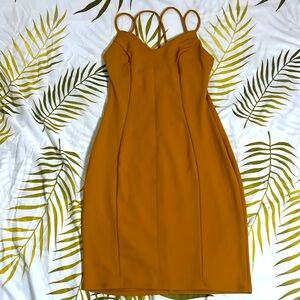 Strapped  mustard color dress. Only worn once